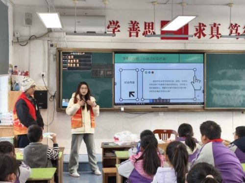 防诈进校园 趣味学安全  ——江苏商贸职业学院“微光润禾·稚梦启航”青年志愿服务队走进沿河桥小学开展主题活动