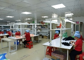 硅胶服装标牌固定方式：车缝与热压对比